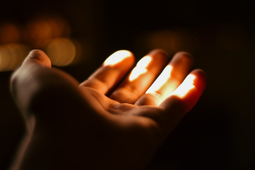 A softly lit candle