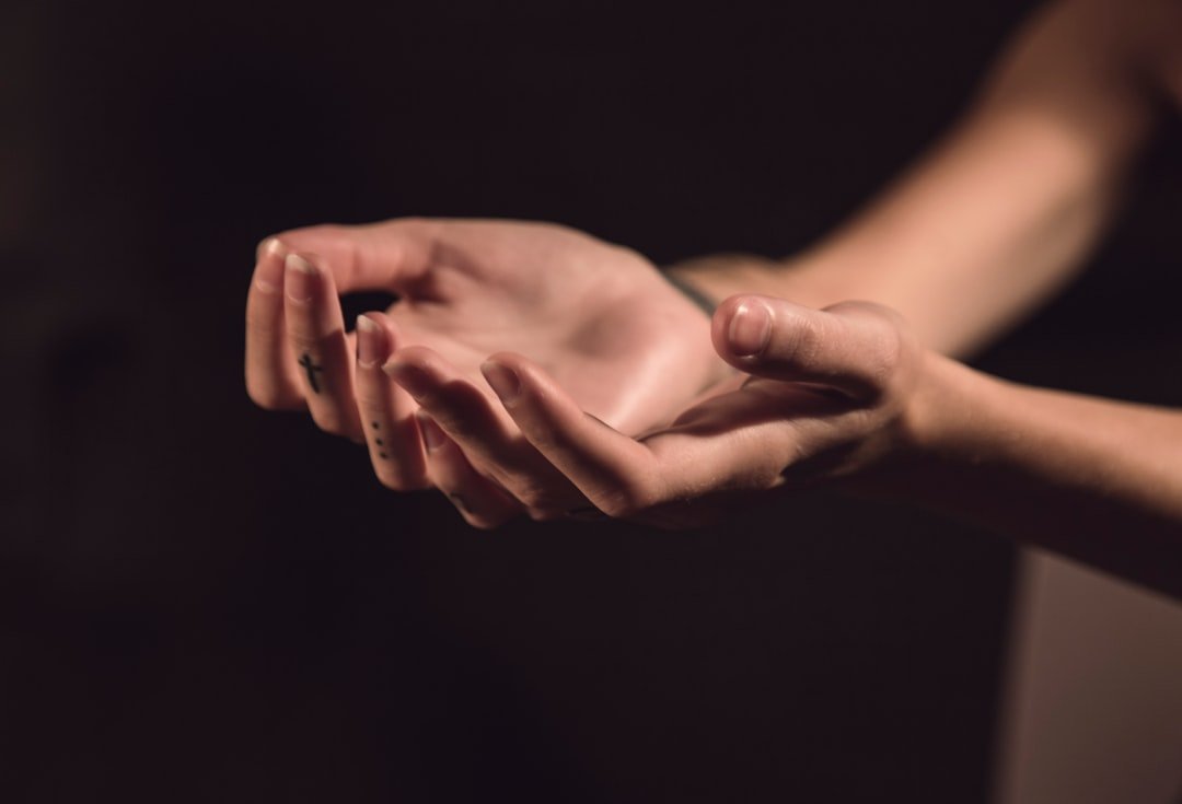 Two open palms, symbolizing pranic healing